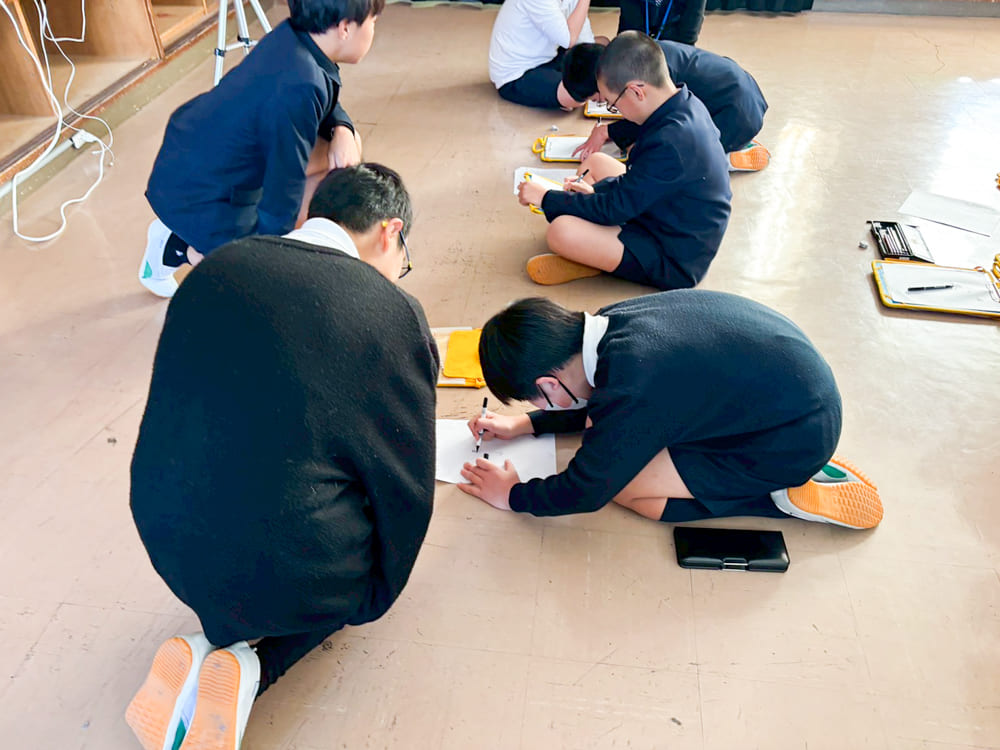 広島市立中島小学校6年生約50名に「デザイナーの仕事」について職業講話を行いました